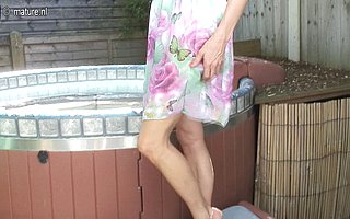 Horny housewife from the UK masturbating in the hot tub